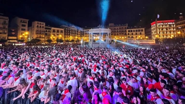 students enjoying the nightlife during the San Fermín festival in Pamplona